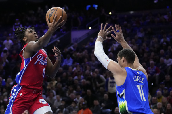  恩比德统治攻防，76人击败热火豪取四连胜